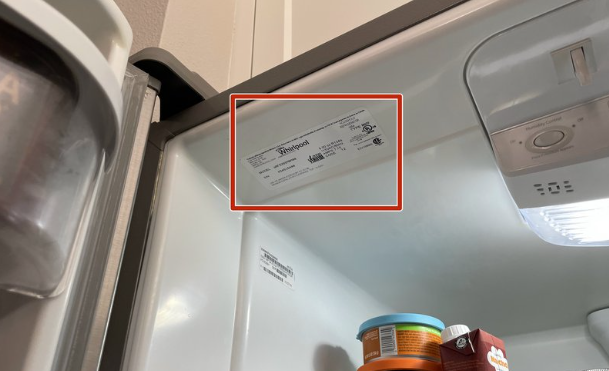 Model tag near the upper inside wall of a refrigerator