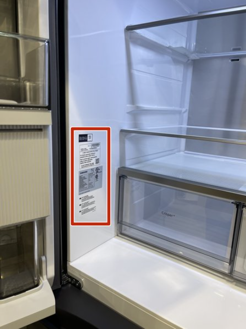 Model tag on the inside side wall of a refrigerator
